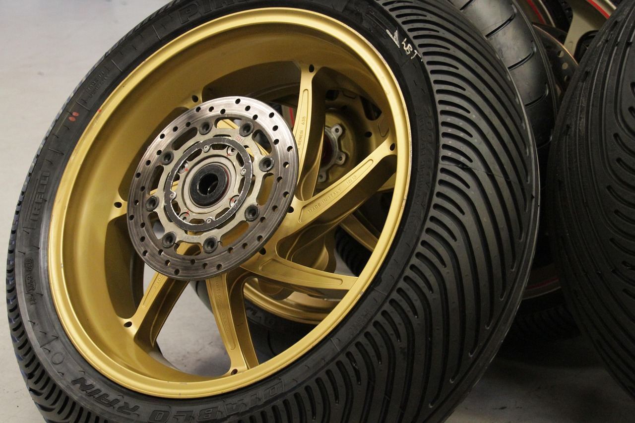 Technician checking a wheel after a spare install
